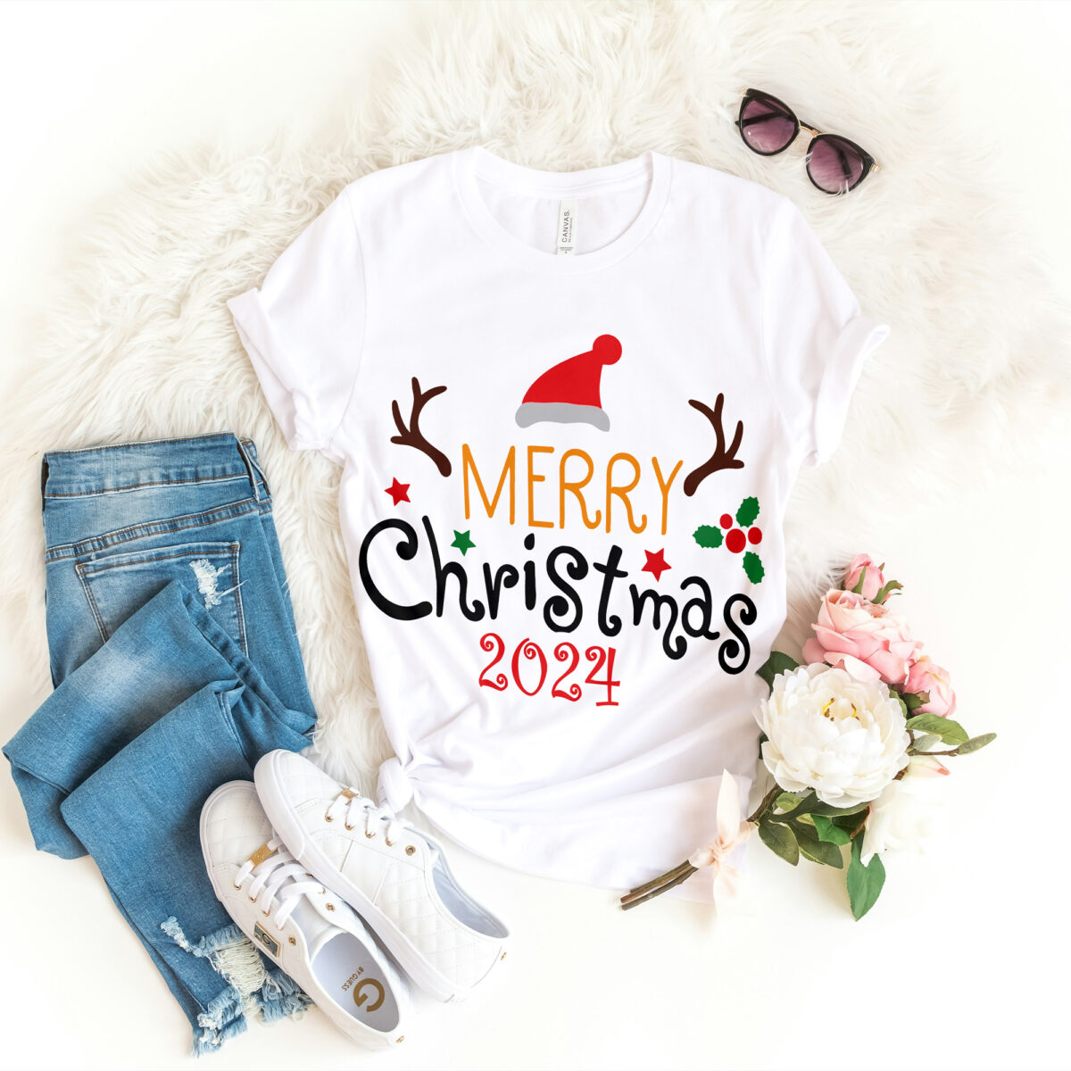 a white shirt with a text on it and jeans and sunglasses merry Christmas 2024